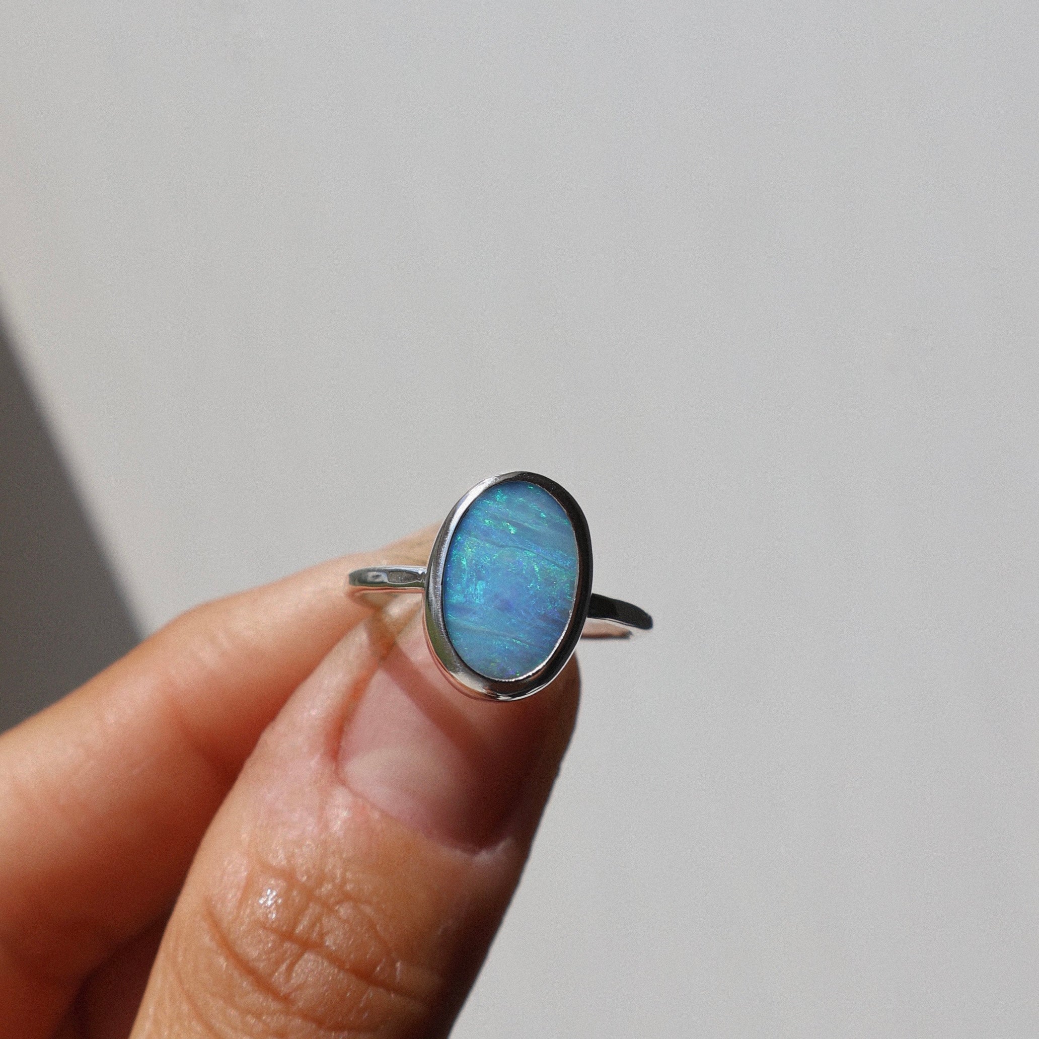 Blue oval hammered ring