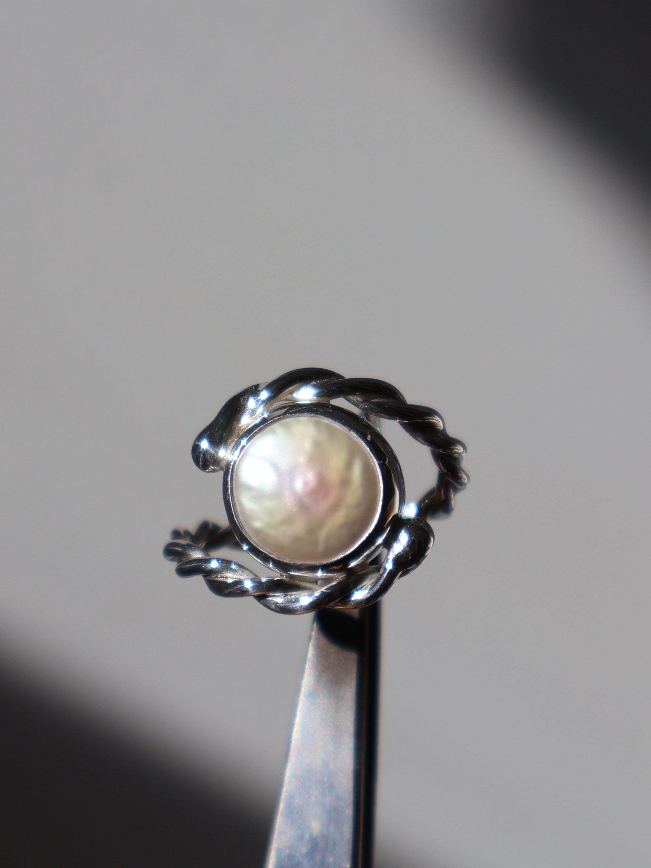 Twisted pearl ring
