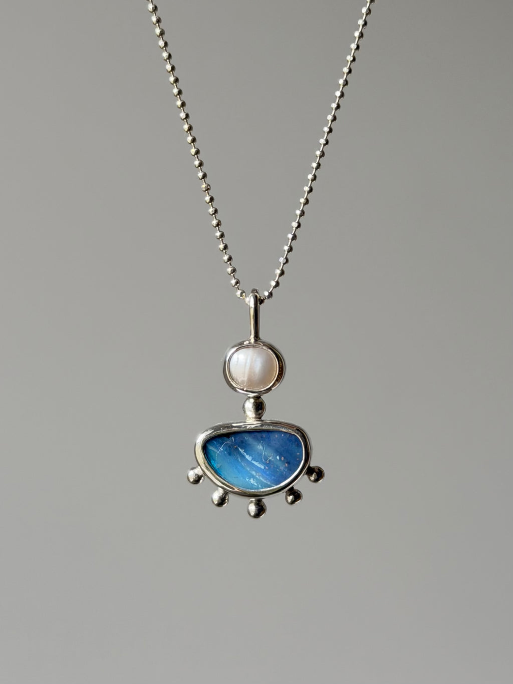 Opal and pearl pendant