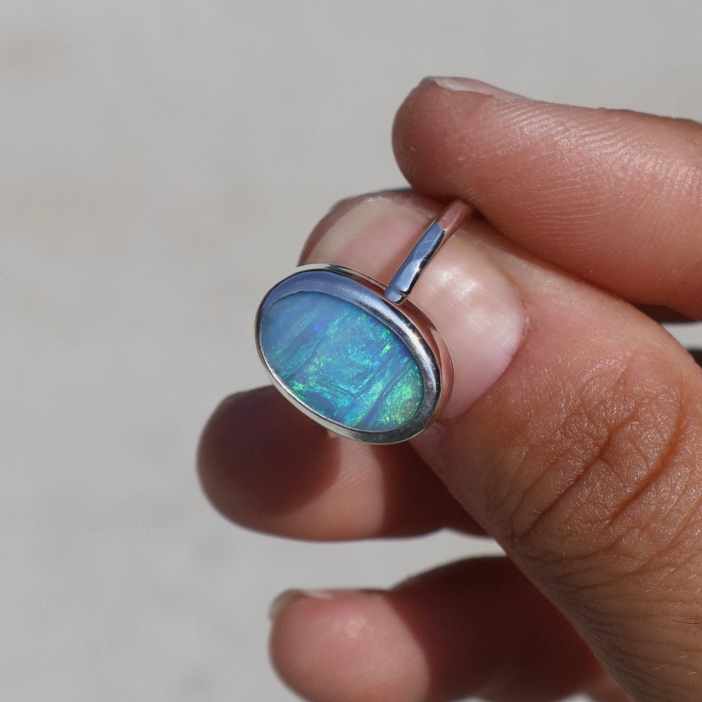 Blue oval hammered ring