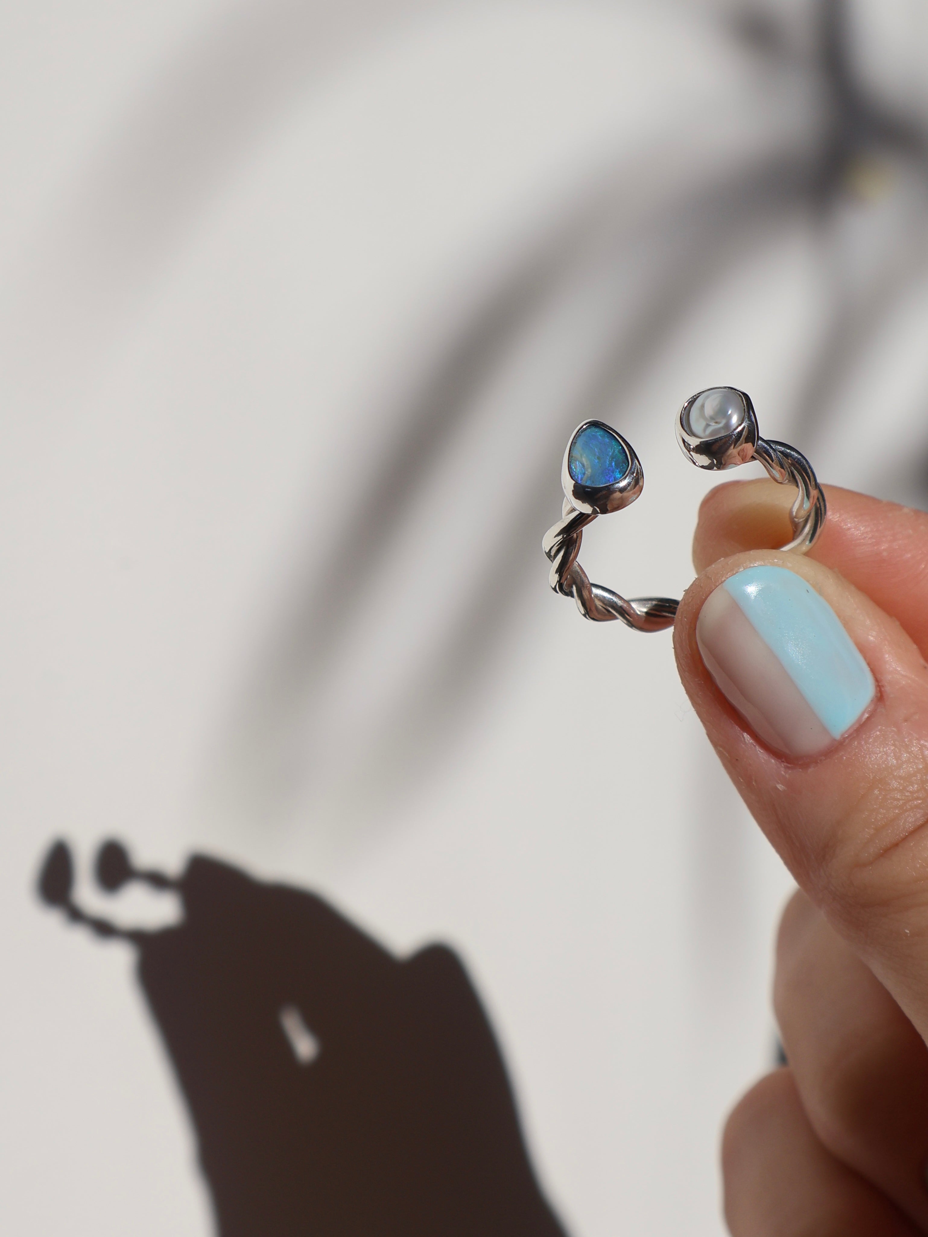Twisted opal and pearl ring