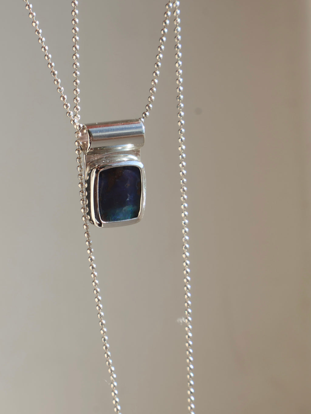 Modern opal pendant