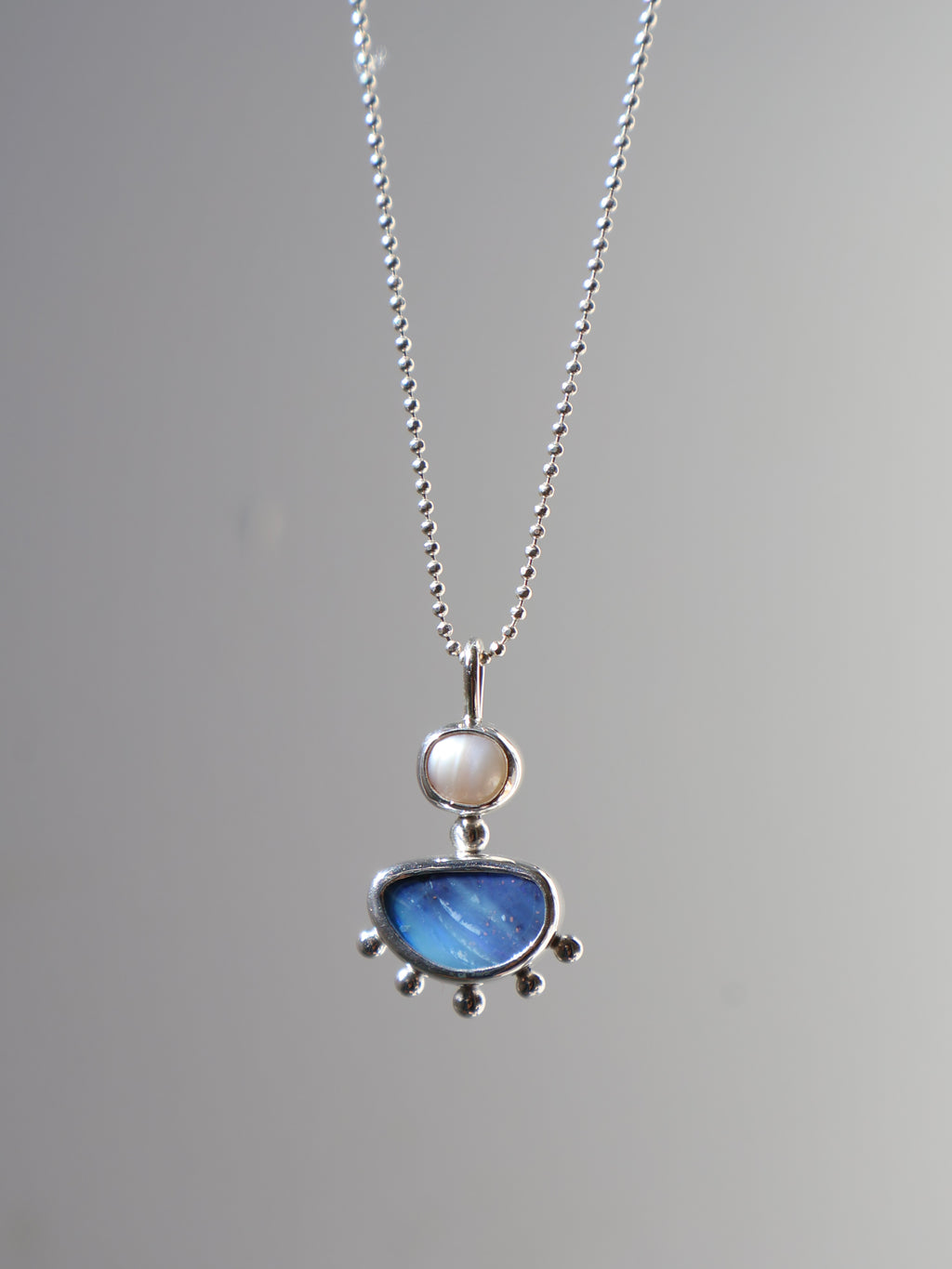 Opal and pearl pendant
