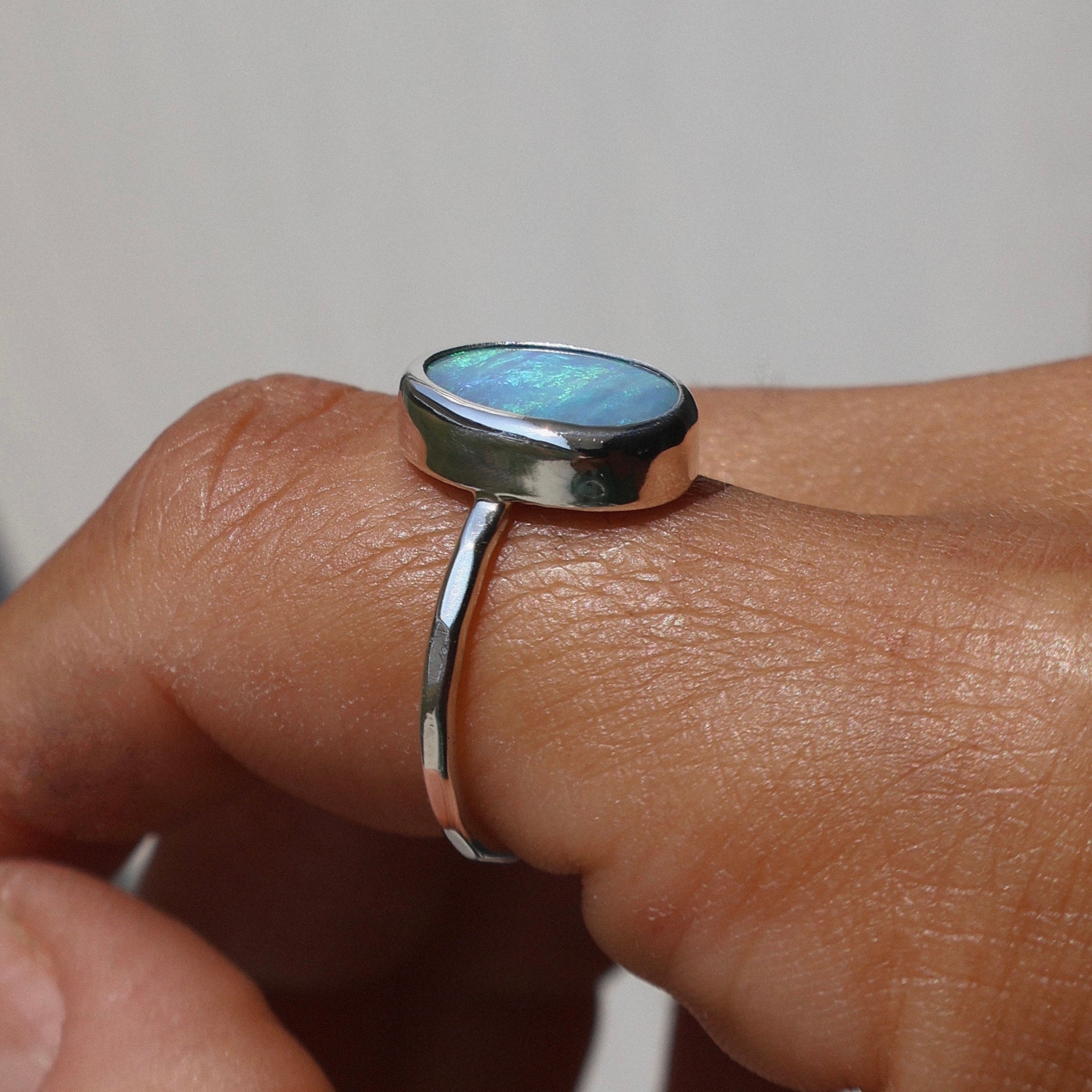 Blue oval hammered ring