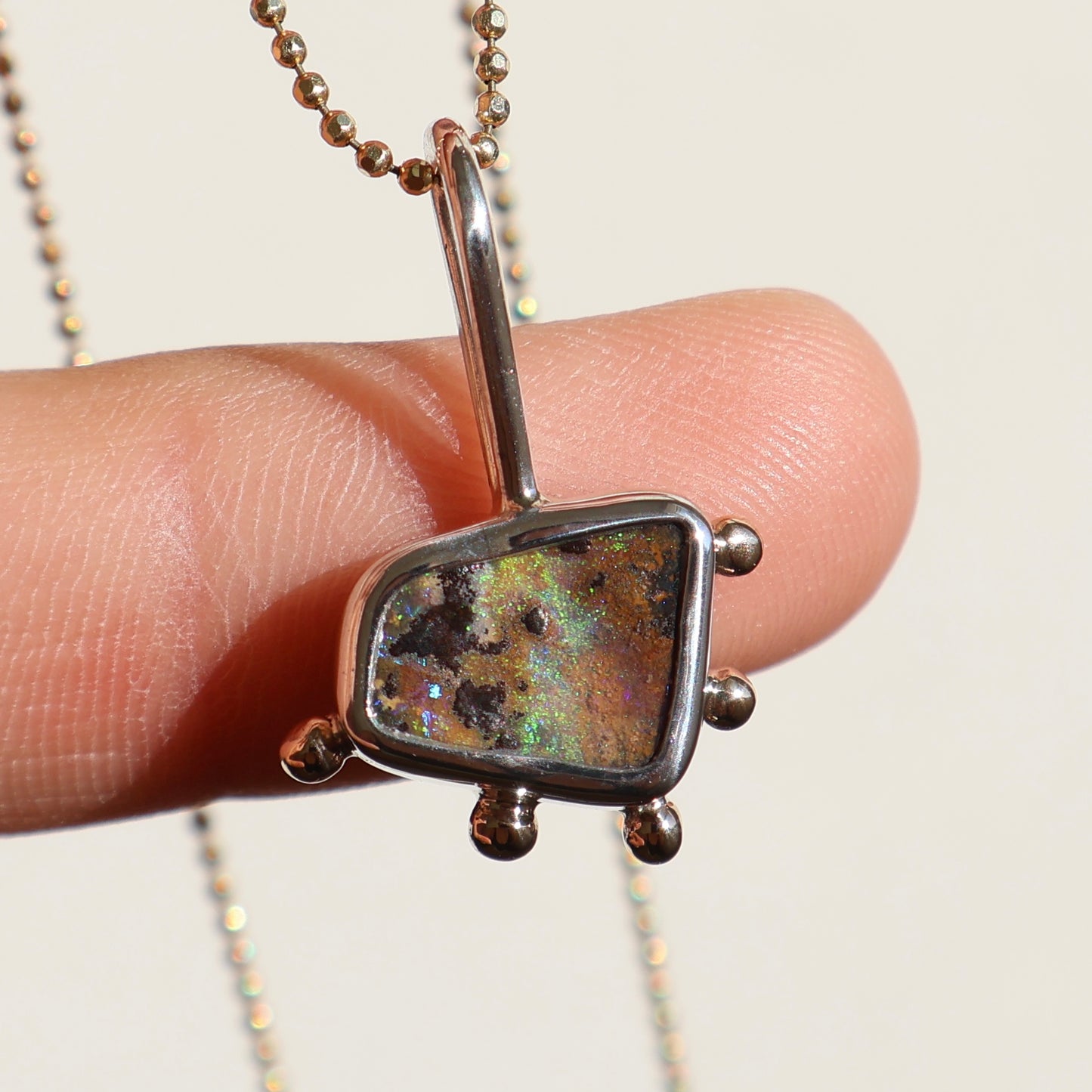 Gold and silver Opal pendant