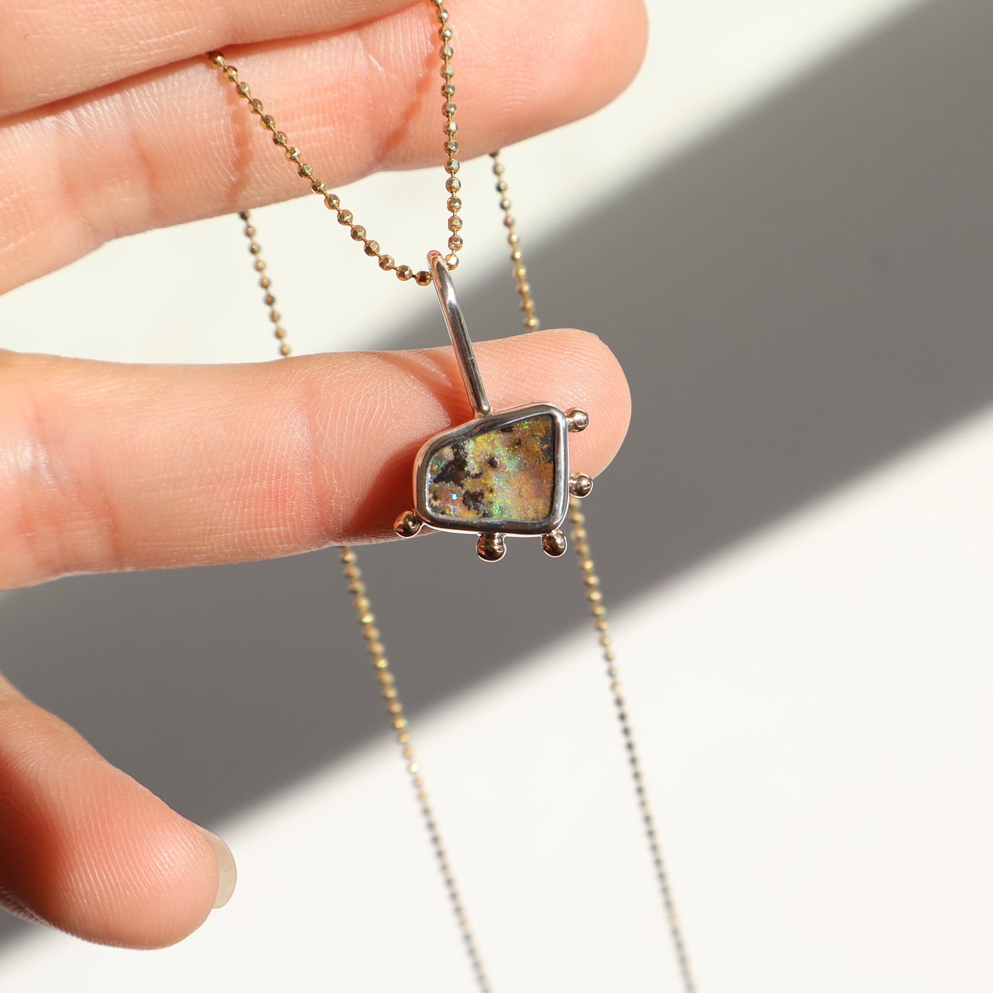 Gold and silver Opal pendant