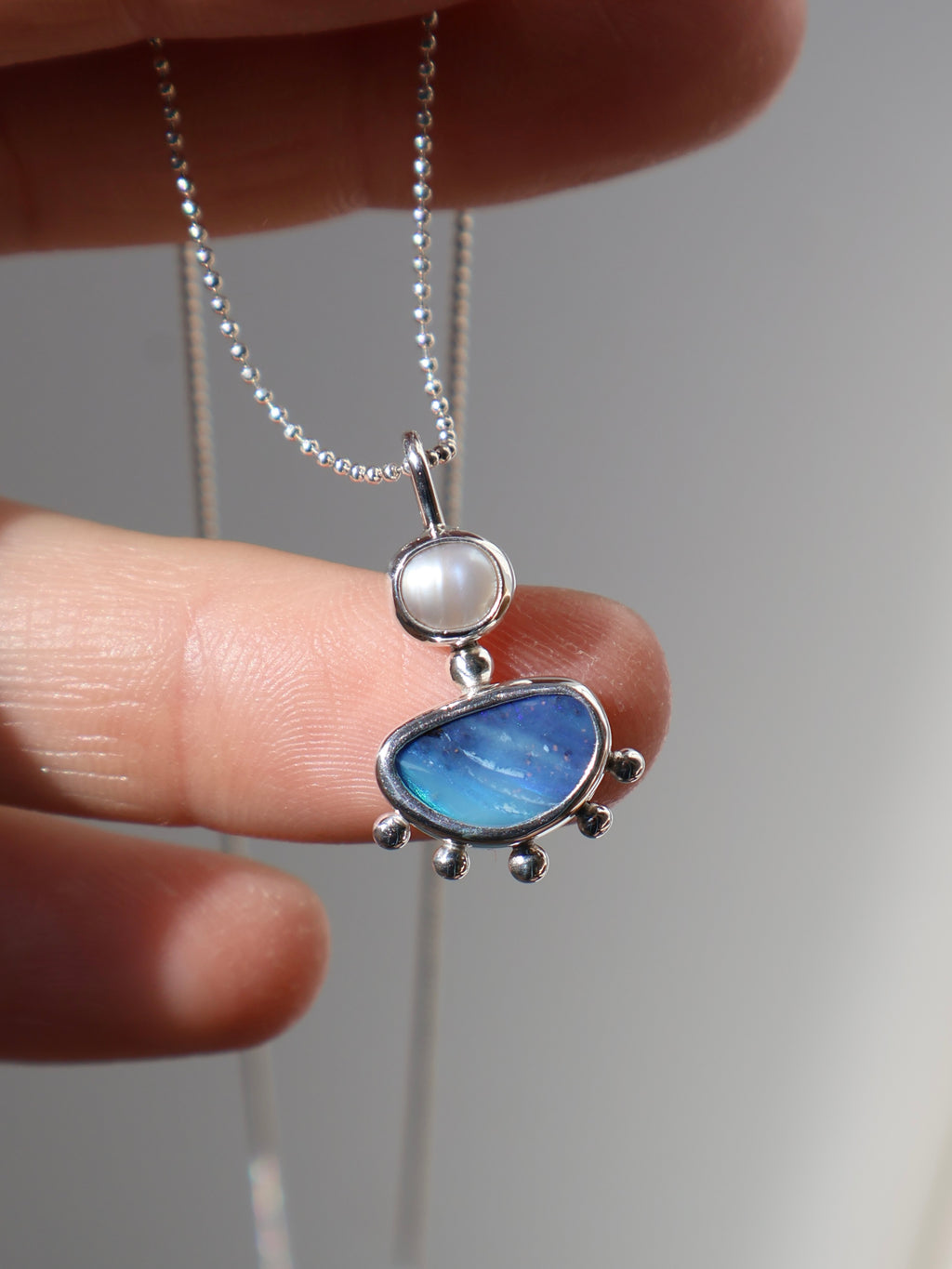 Opal and pearl pendant