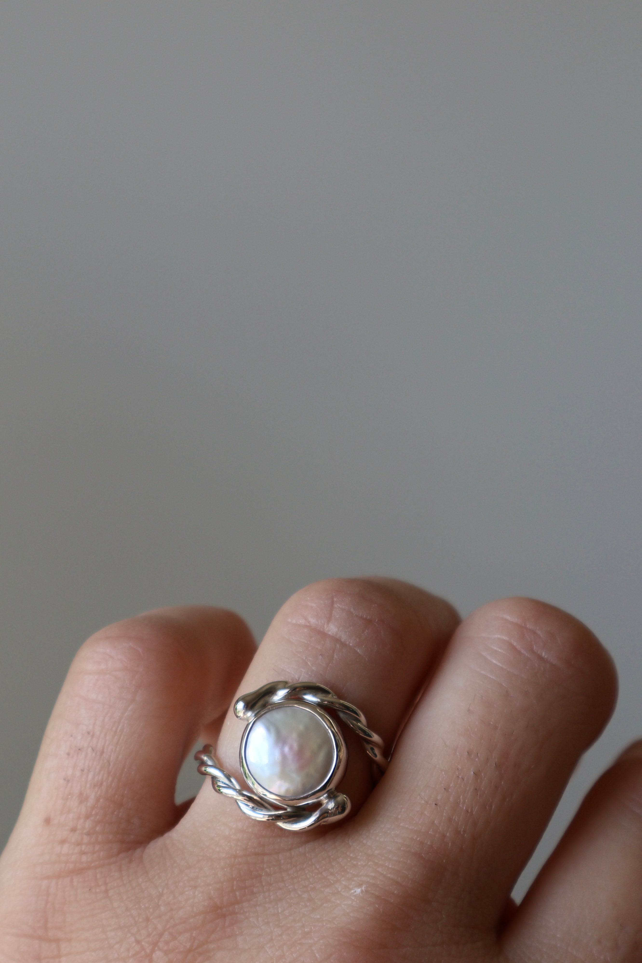 Twisted pearl ring