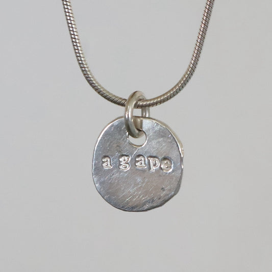 'Agape' coin pendant