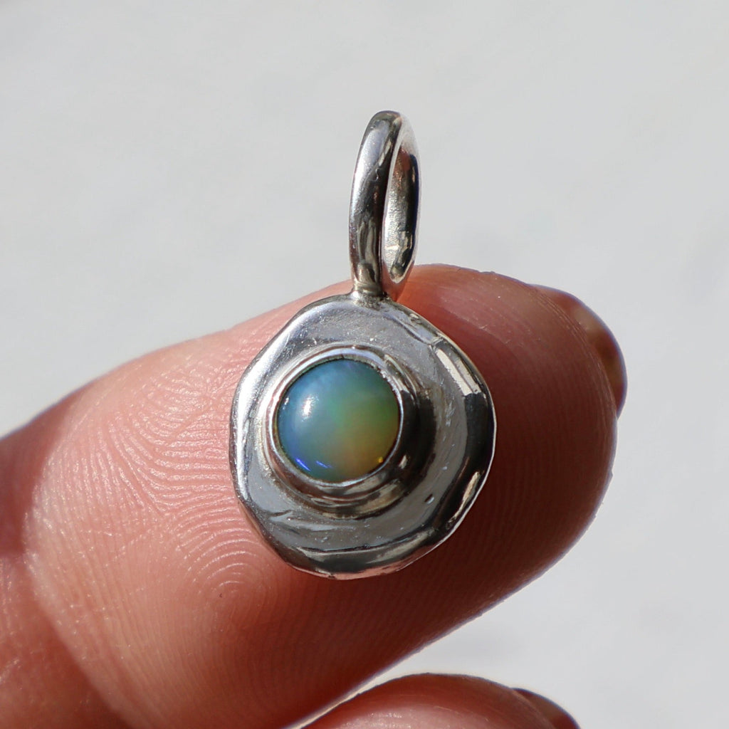 Opal and fine silver pendant