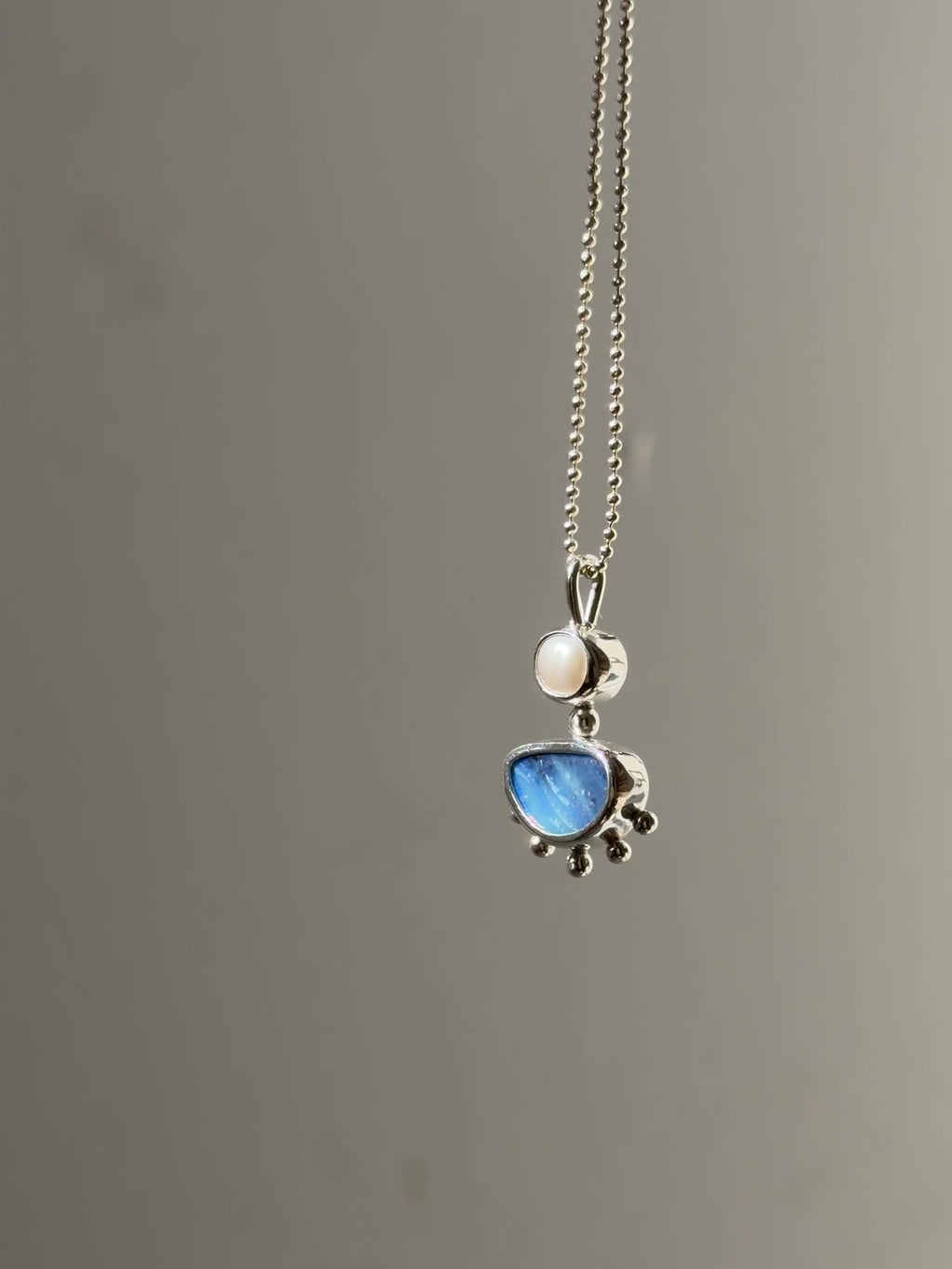 Opal and pearl pendant