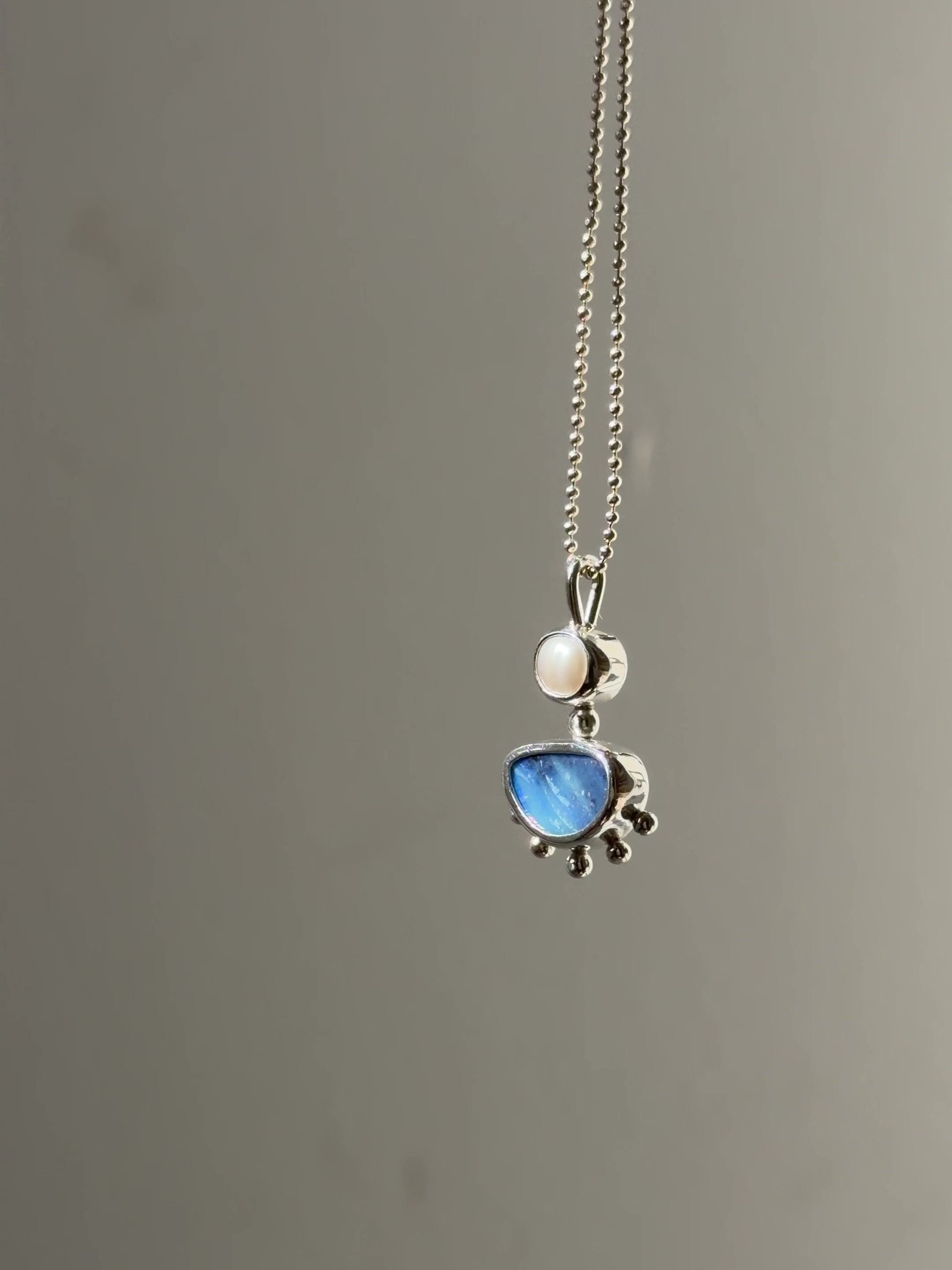 Opal and pearl pendant