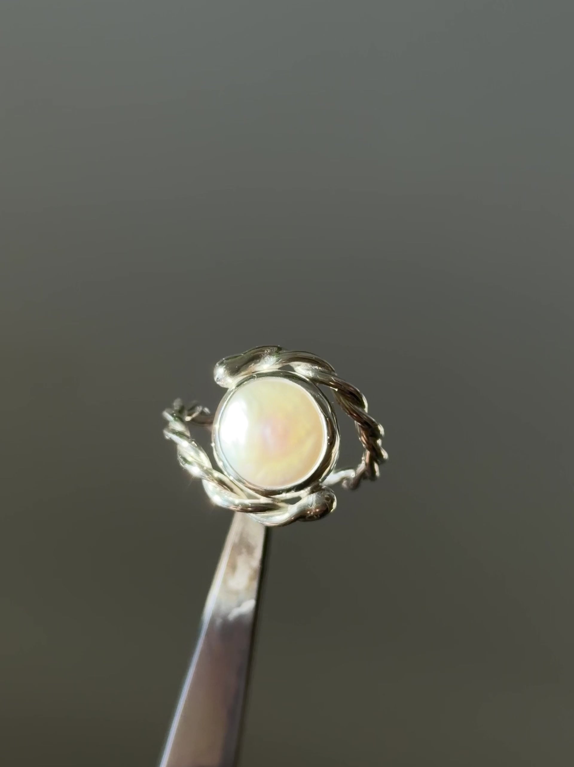 Twisted pearl ring